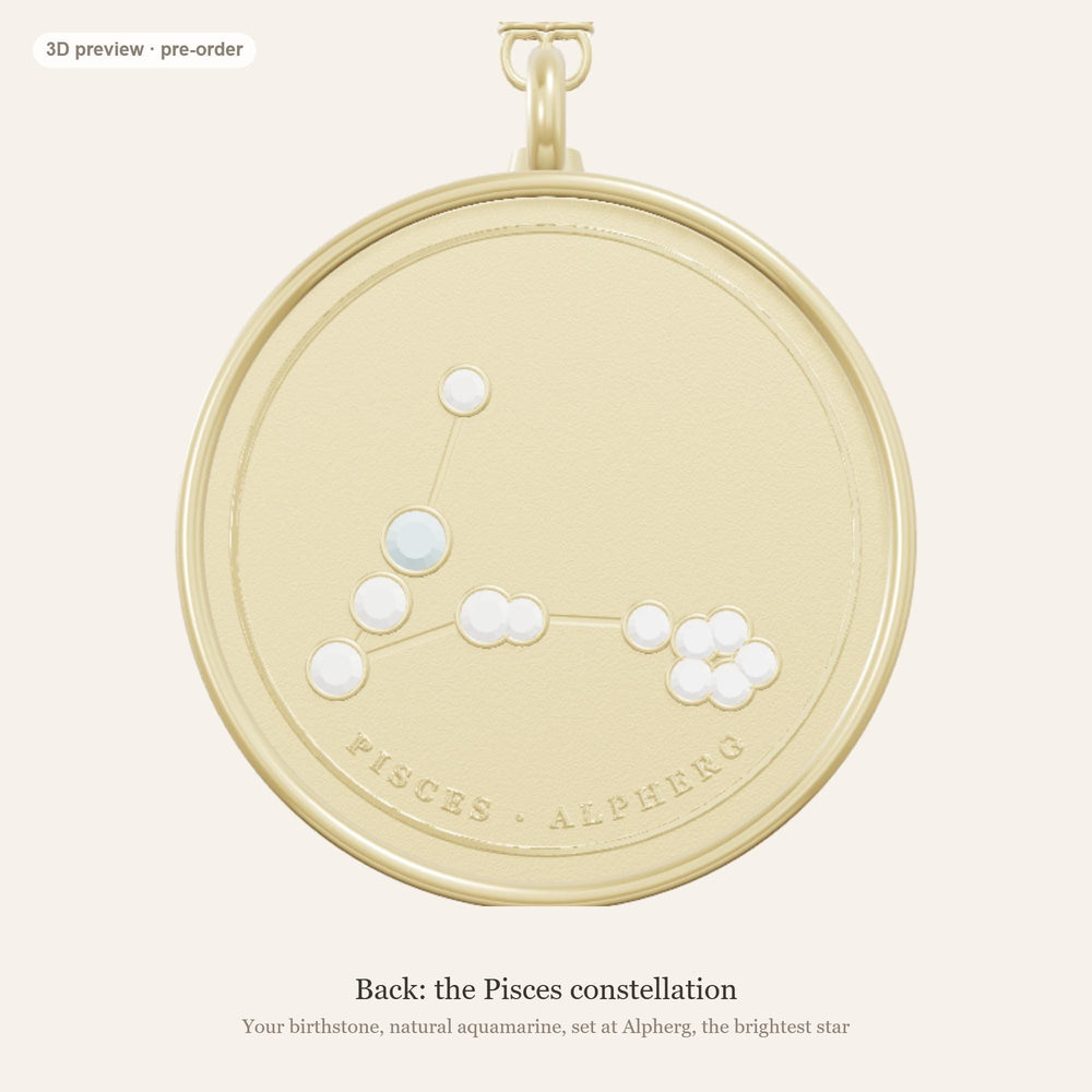Back of the Pisces coin showing the constellation in lab-grown diamond stars, with a natural aquamarine at Alpherg