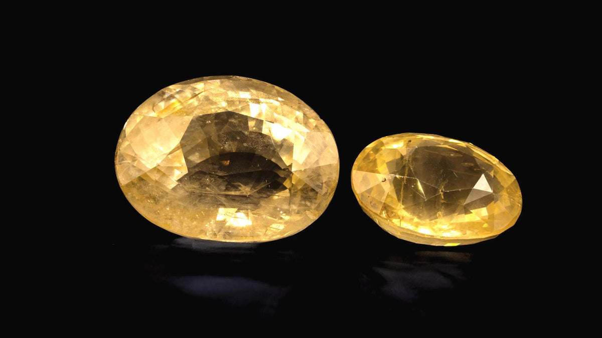 Pair of natural unheated Ceylon yellow sapphires (Pukhraj), golden ovals