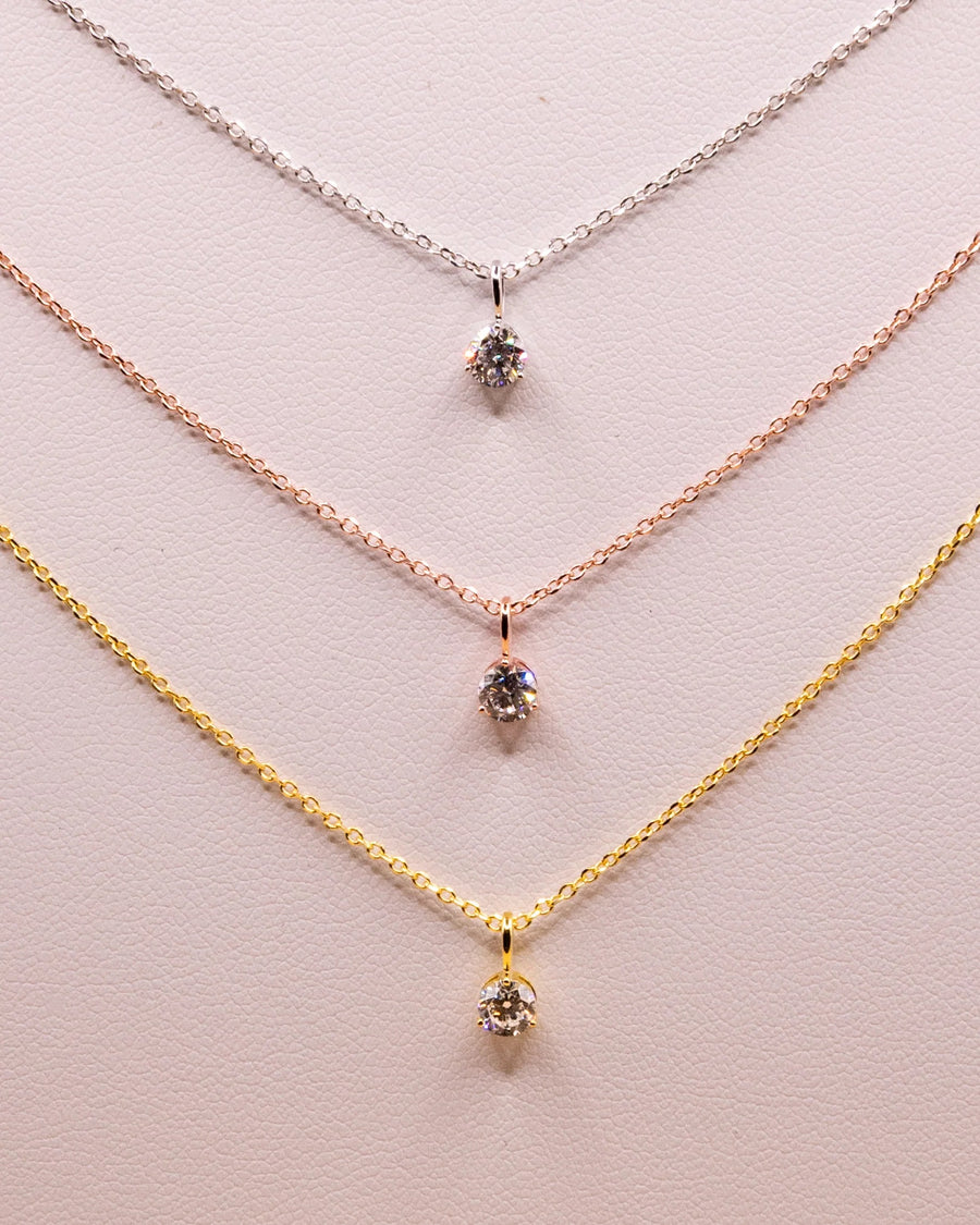 0.50 ct solitaire necklaces in white rhodium, rose gold and yellow gold plated 925 silver