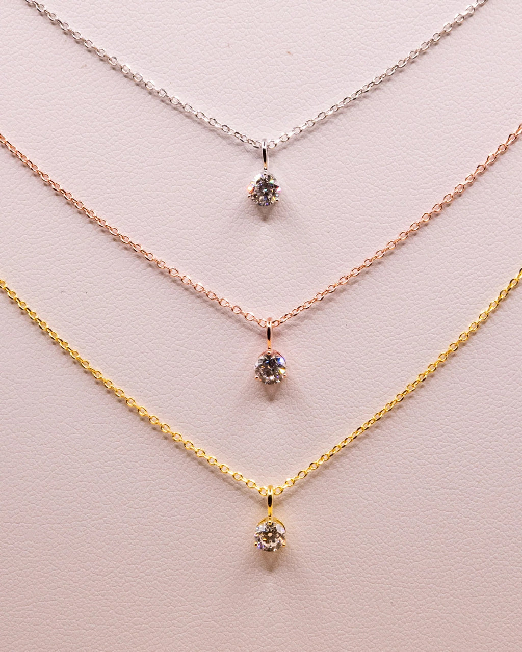 0.50 ct solitaire necklaces in white rhodium, rose gold and yellow gold plated 925 silver