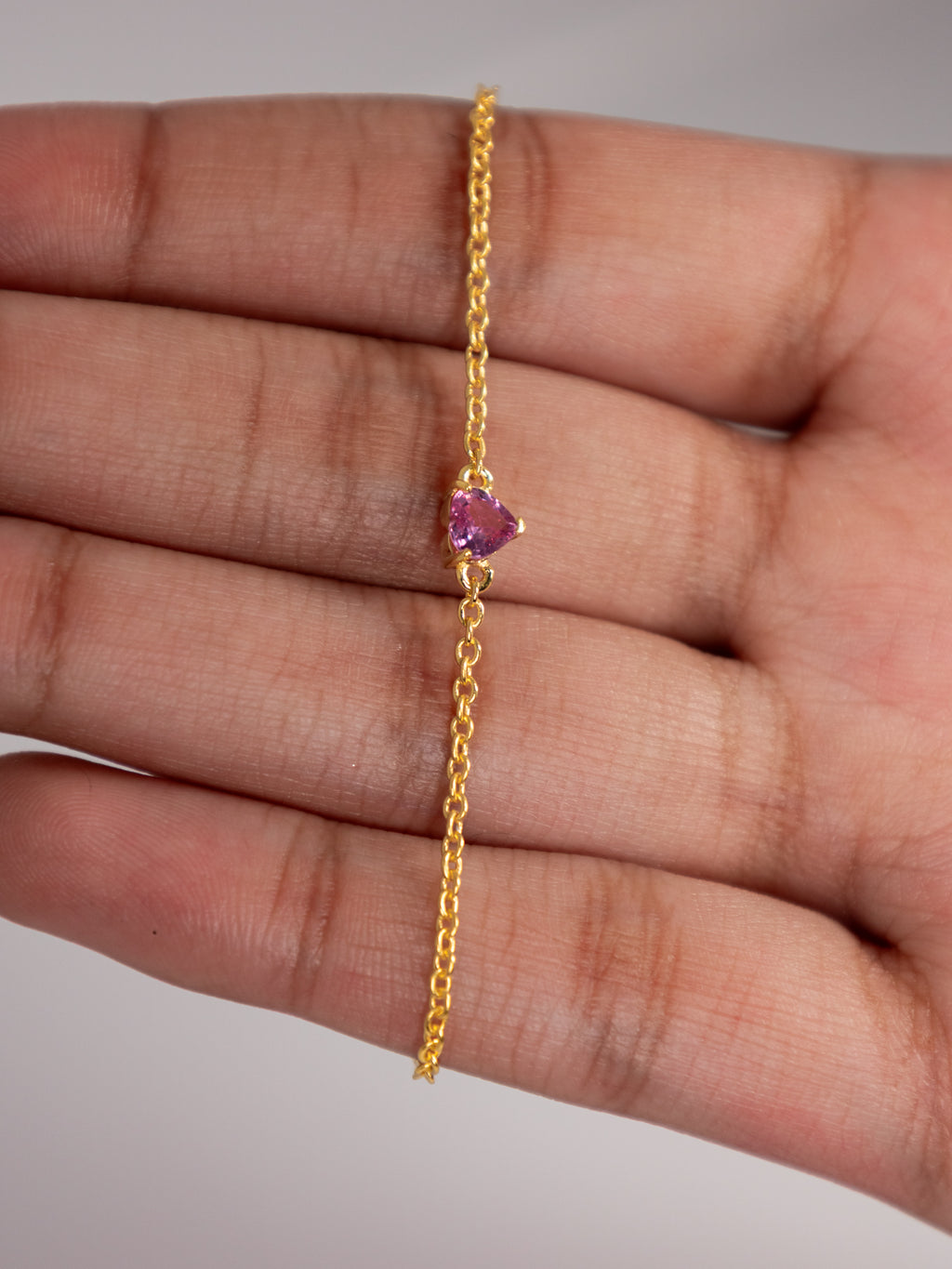 Pink sapphire heart bracelet in the hand, 4 mm natural heart, yellow gold plated 925 silver