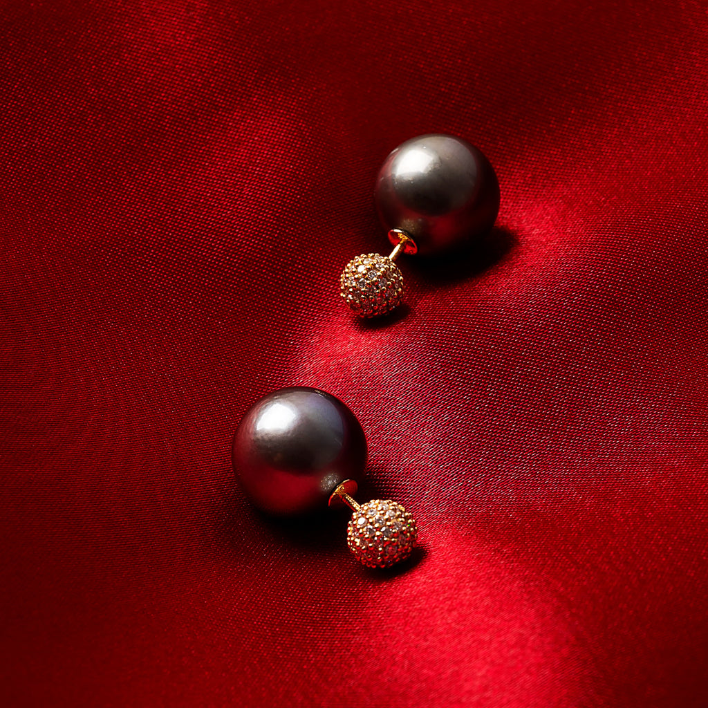 Tahitian pearl and diamond front-back earrings in 18K yellow gold on red silk