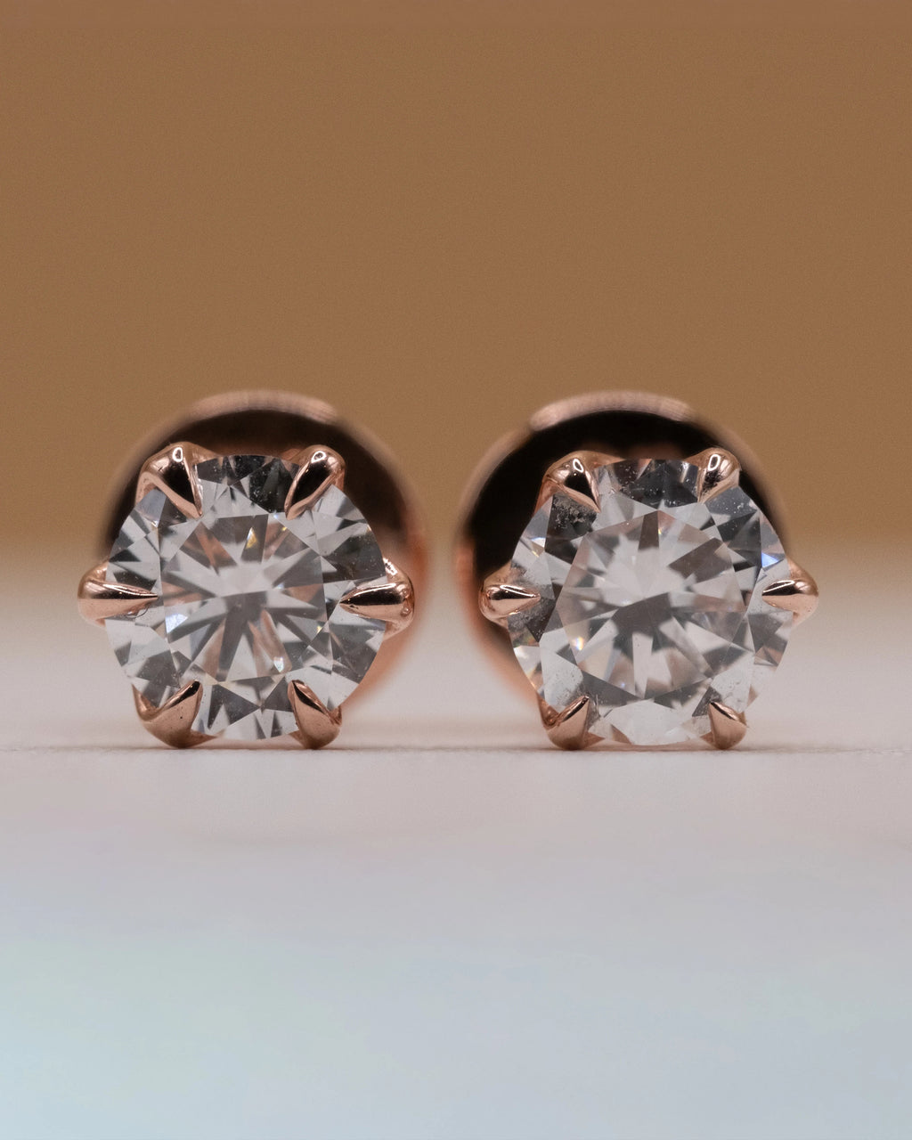 1 carat stud earrings in rose gold plated 925 silver with two 0.50 ct lab-grown diamonds