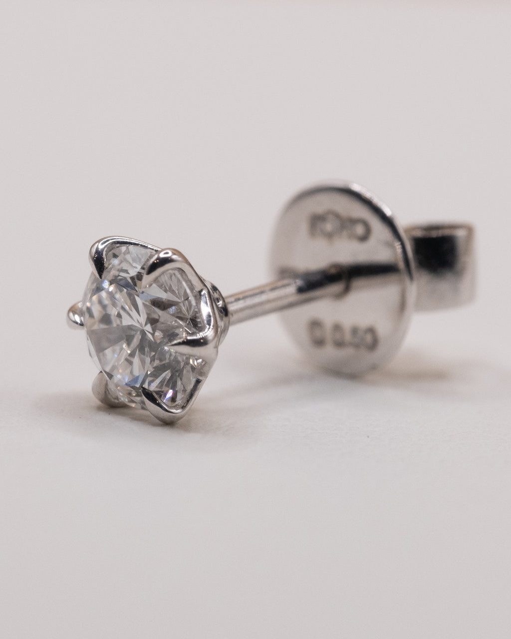 Side view of a six-prong lab-grown diamond stud in white rhodium plated 925 silver