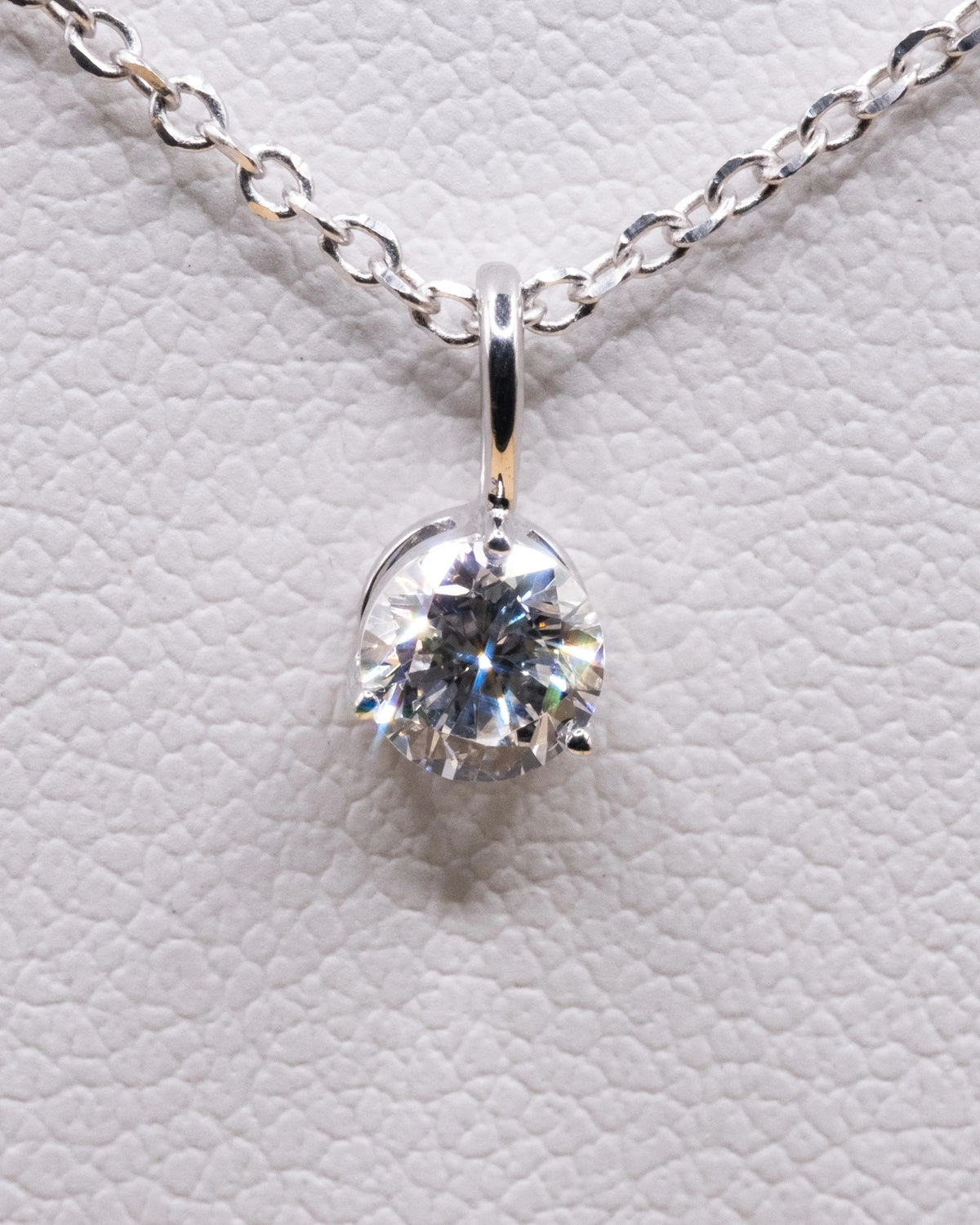 Close up of the 0.50 ct lab-grown diamond pendant in a white rhodium setting