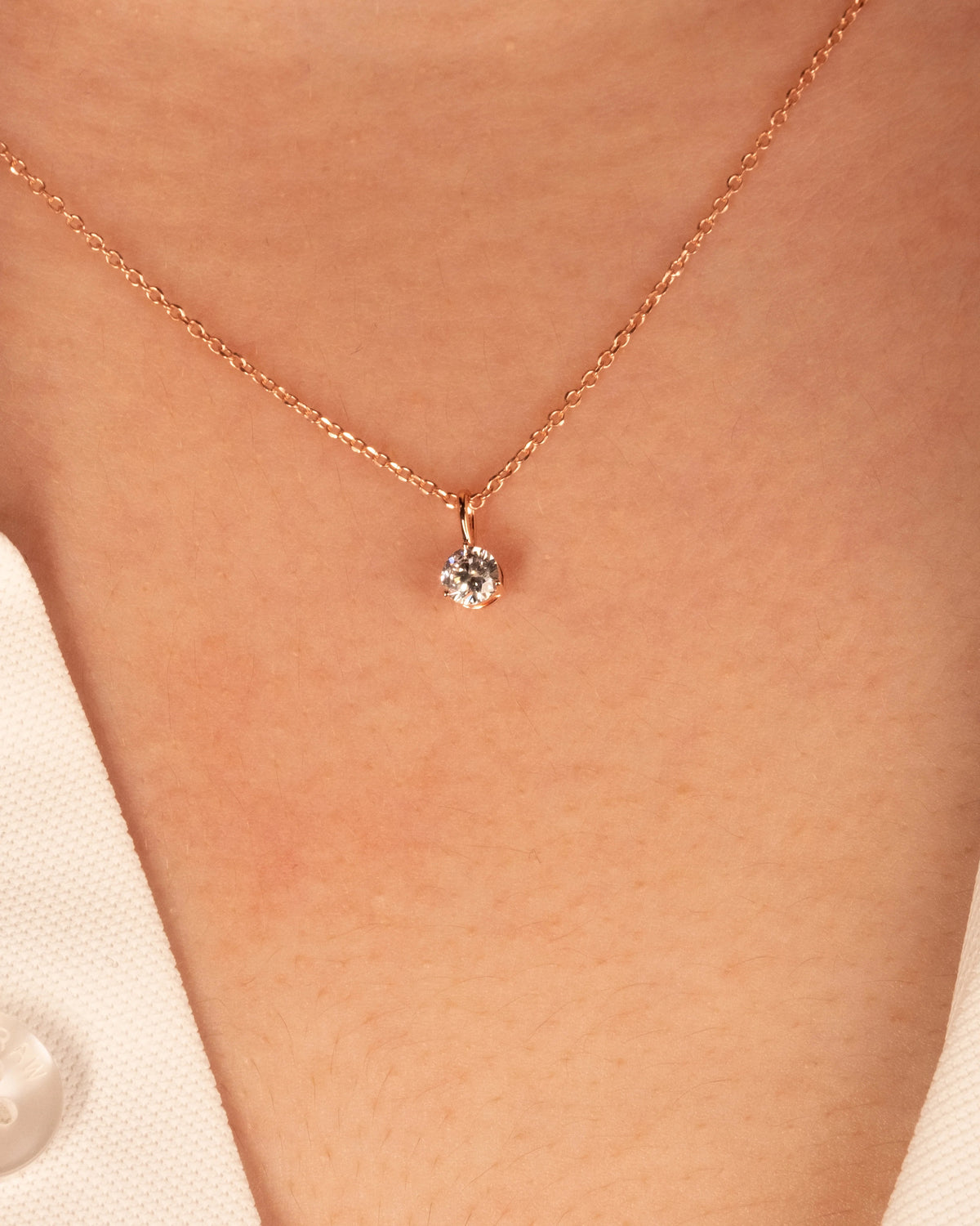 Rose gold plated 0.50 ct solitaire necklace, worn