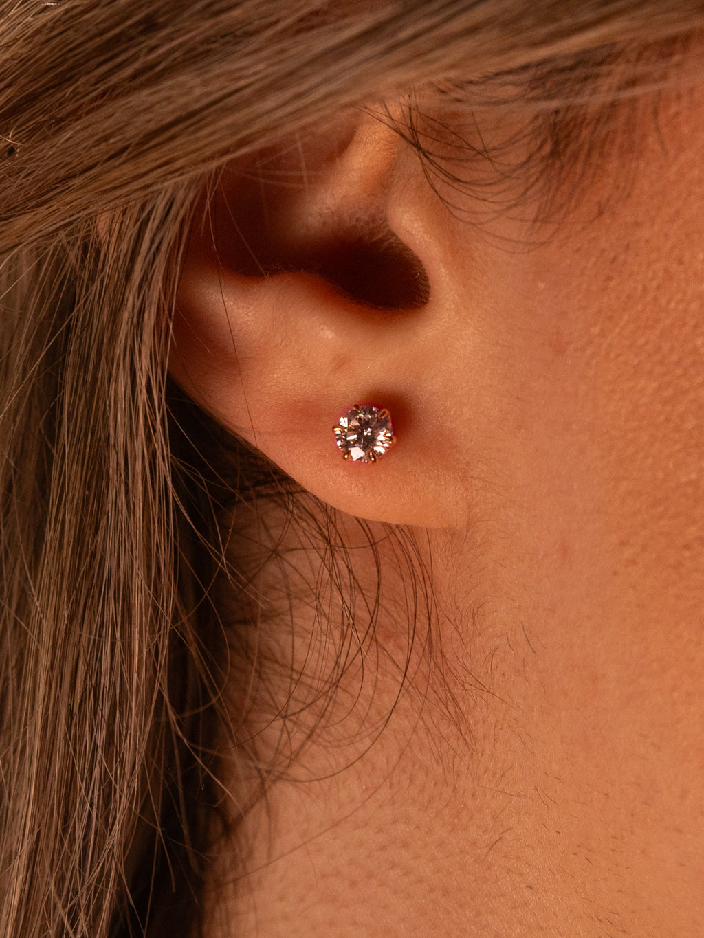 Lab-grown diamond stud earring, 0.50 ct, worn