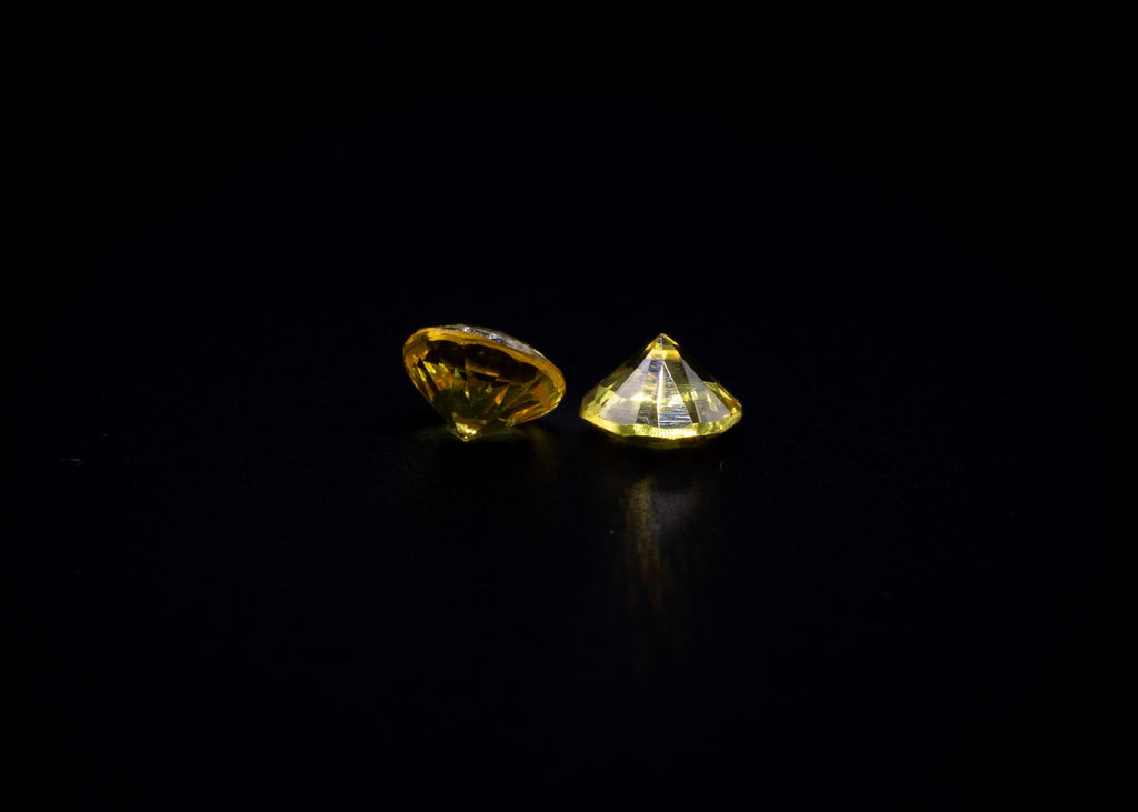 0.65 ct golden yellow sapphire pair, 4 mm rounds, view 3