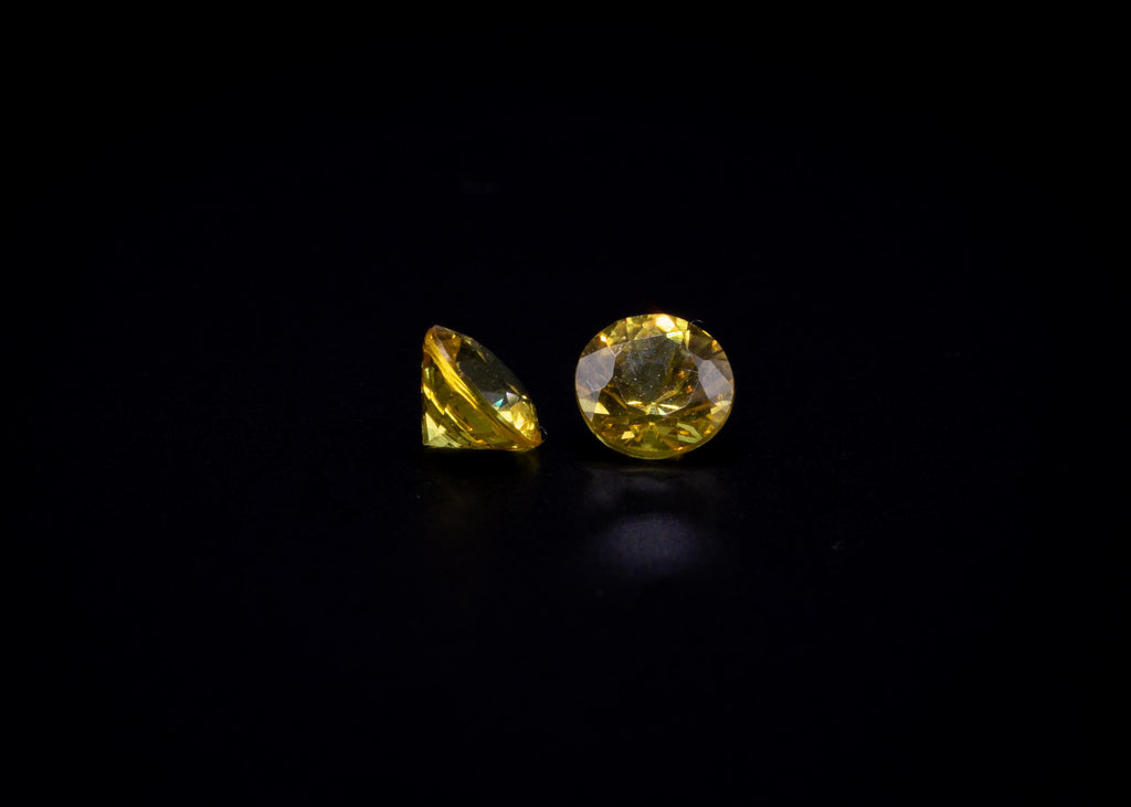 0.68 ct yellow sapphire matched pair, 4 mm rounds, view 5