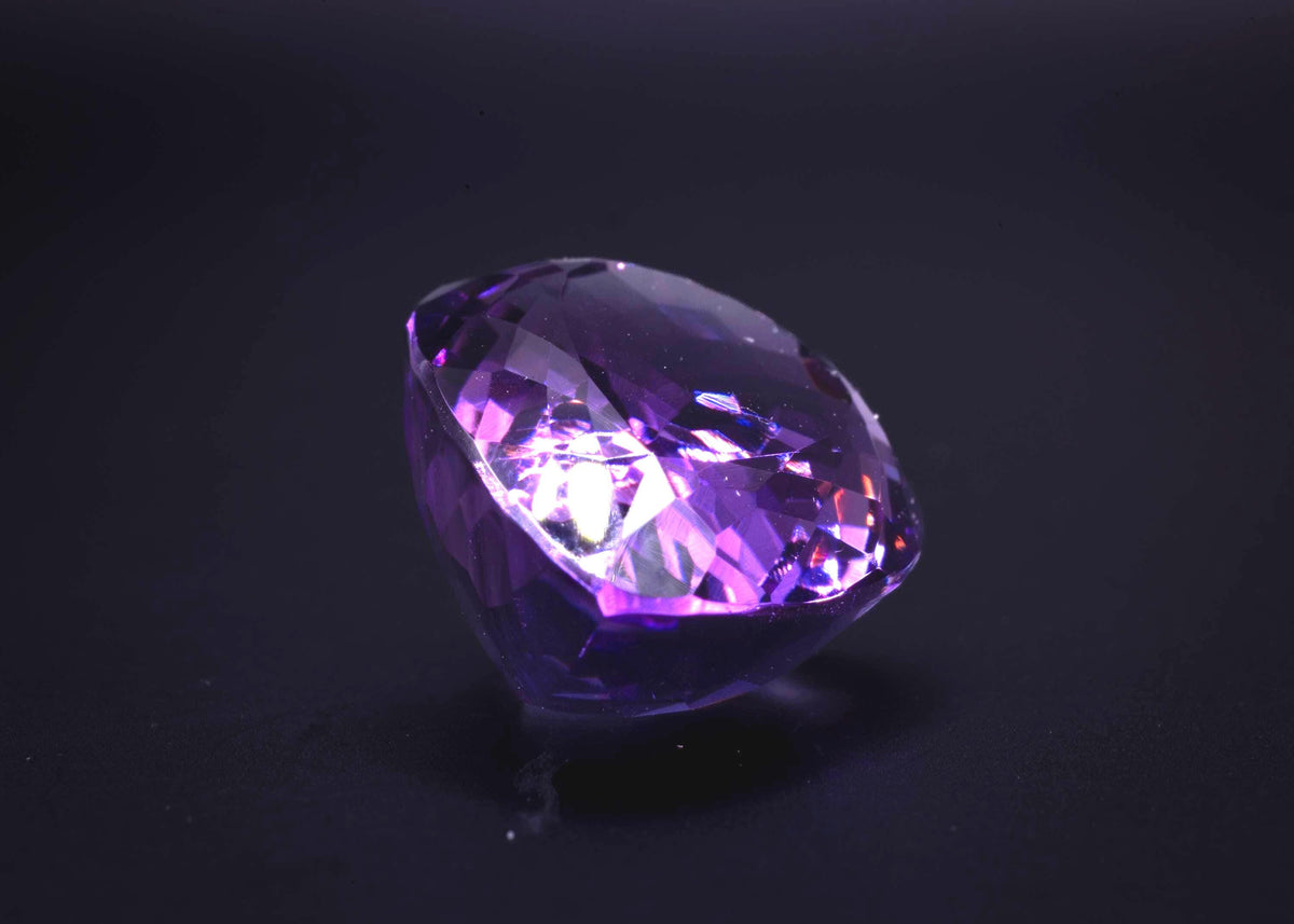22.14 ct deep purple amethyst, pear cut, loose, view 5