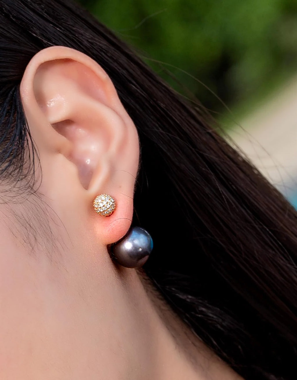 Tahitian pearl and diamond front-back earring in 18K yellow gold, worn on the ear