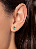 Zambian emerald and diamond halo stud worn on the ear, shown to scale
