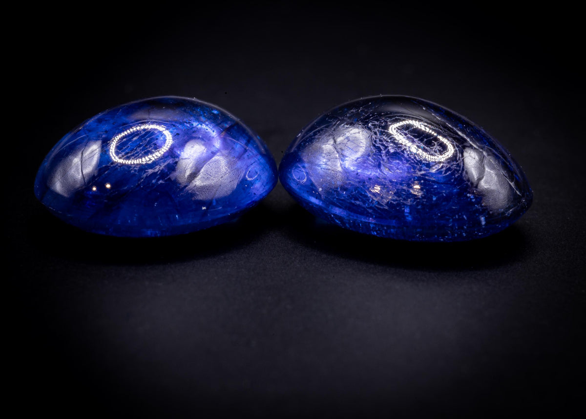 7.90 ct glass-filled blue sapphire cabochon pair, 9x7 mm ovals, view 3