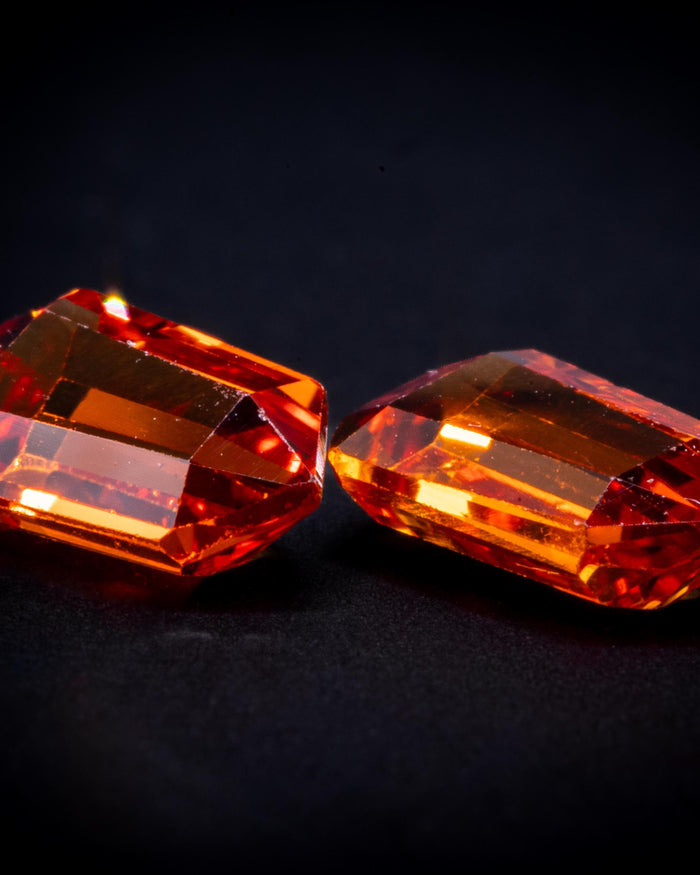 1.06 ct vintage orange sapphire pair, bullet cut