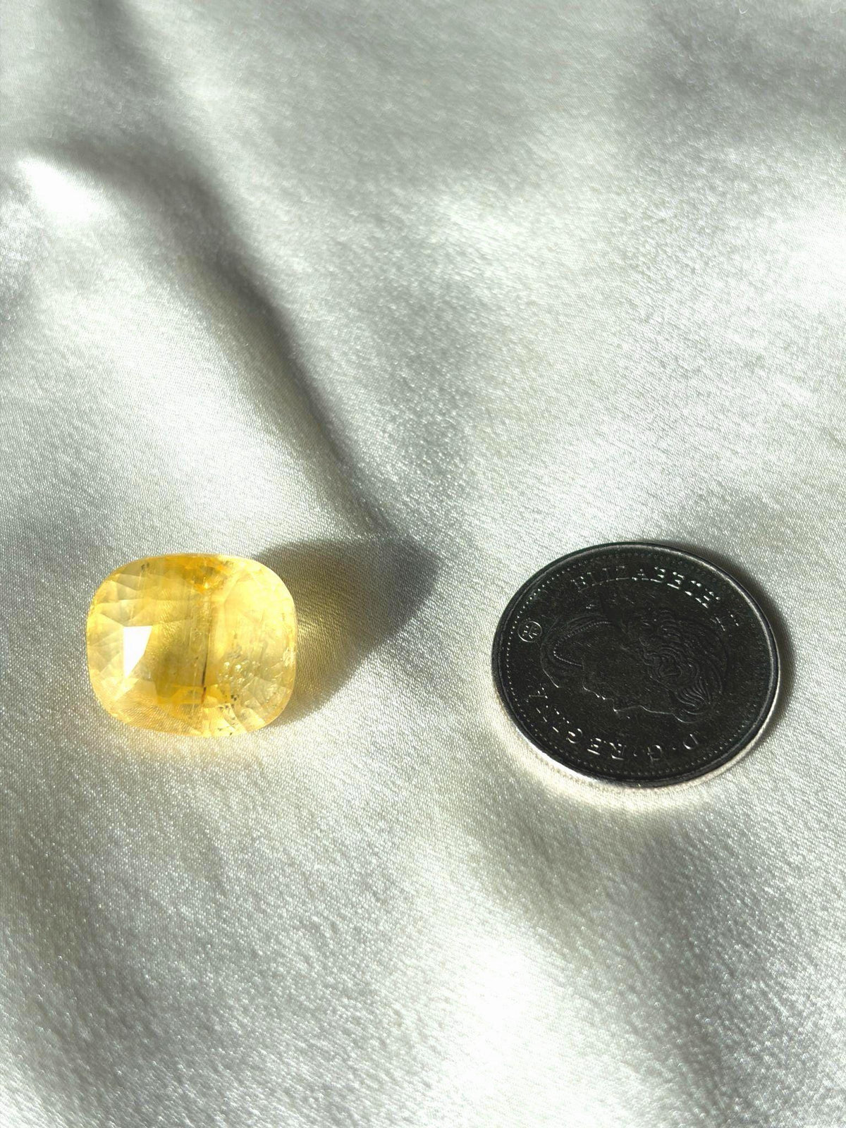 30.47 ct antique unheated Ceylon yellow sapphire, cushion