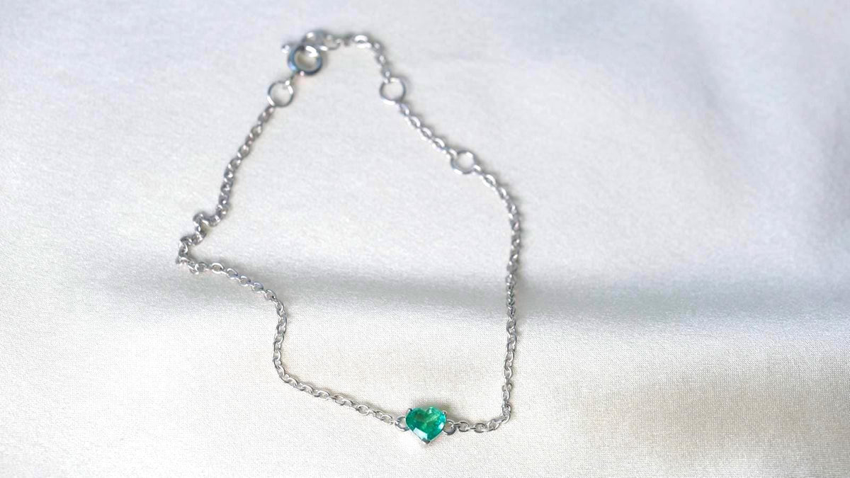 White rhodium plated 925 sterling silver emerald heart bracelet, adjustable 6 to 7 inches with spring ring clasp