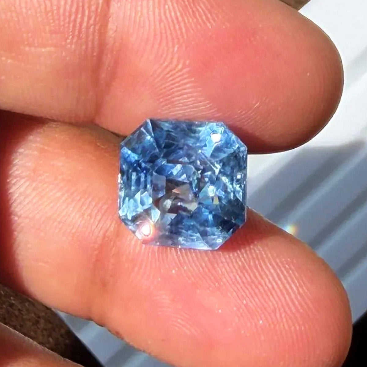 14.59 ct unheated icy blue Ceylon sapphire, emerald cut, view 2