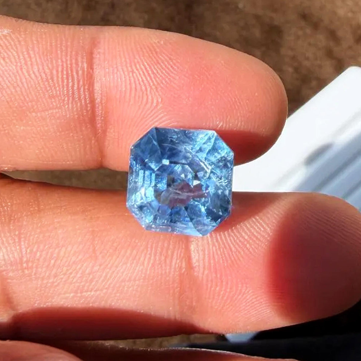 14.59 ct unheated icy blue Ceylon sapphire, emerald cut, view 3