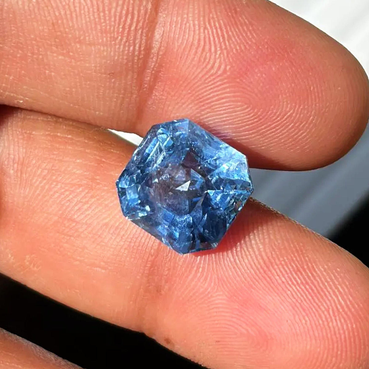 14.59 ct unheated icy blue Ceylon sapphire, emerald cut, view 4