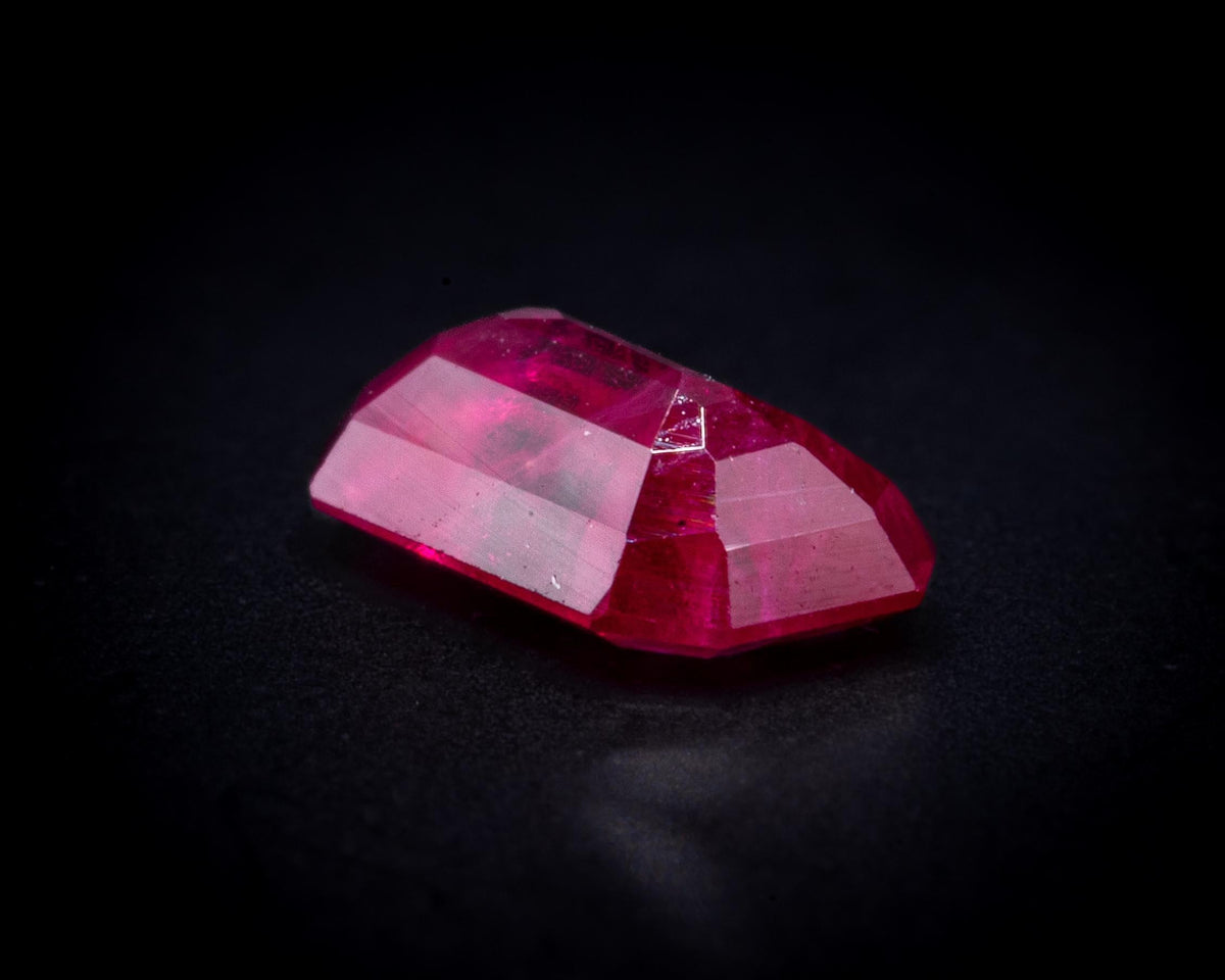 0.60 ct emerald cut Mozambique ruby, loose, view 4