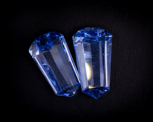 2.39 ct vintage blue sapphire bullet pair, tilted view of the long step facets