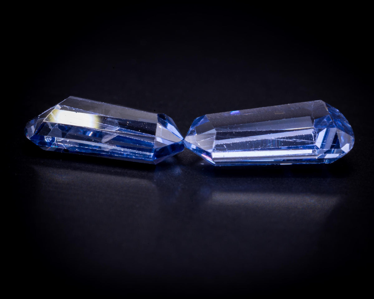 2.39 ct vintage blue sapphire bullet pair, side profile on black