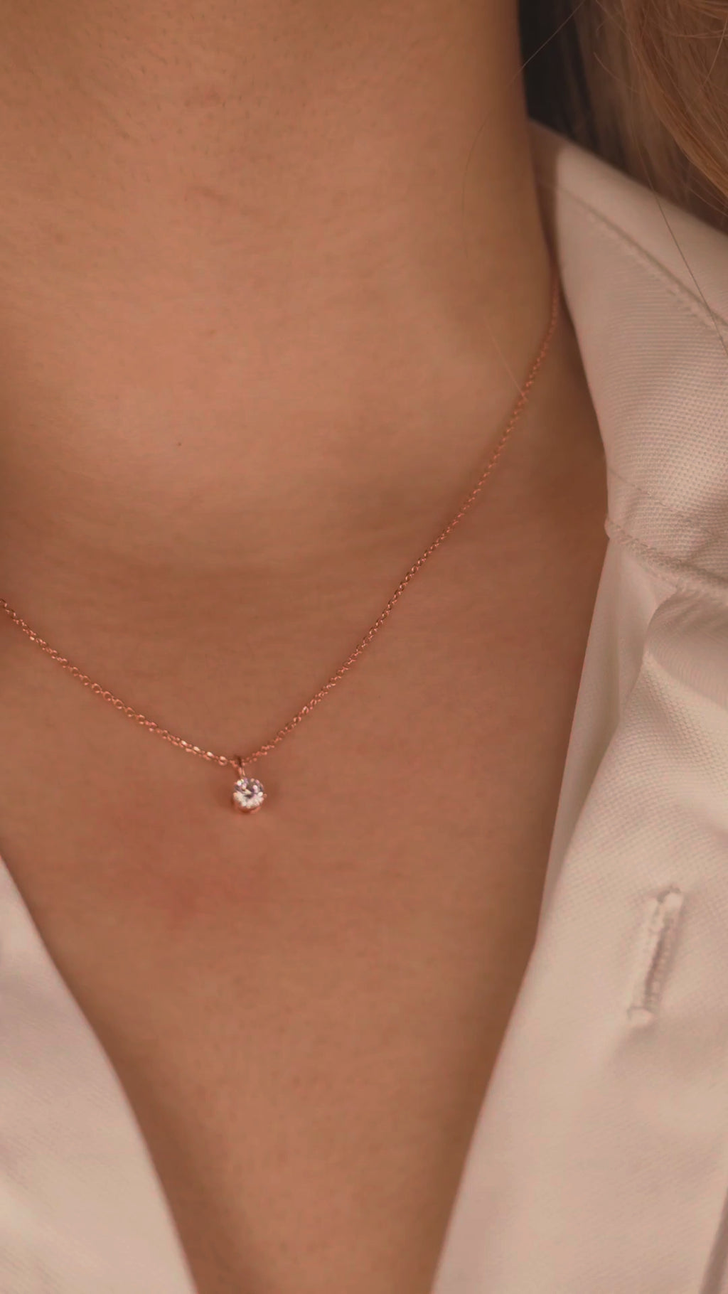 Video: rose gold plated 0.50 ct solitaire necklace worn at the collarbone
