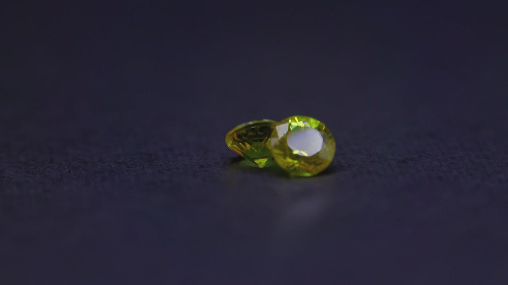 0.70 ct Thai yellow sapphire pair, 4 mm rounds, view 2