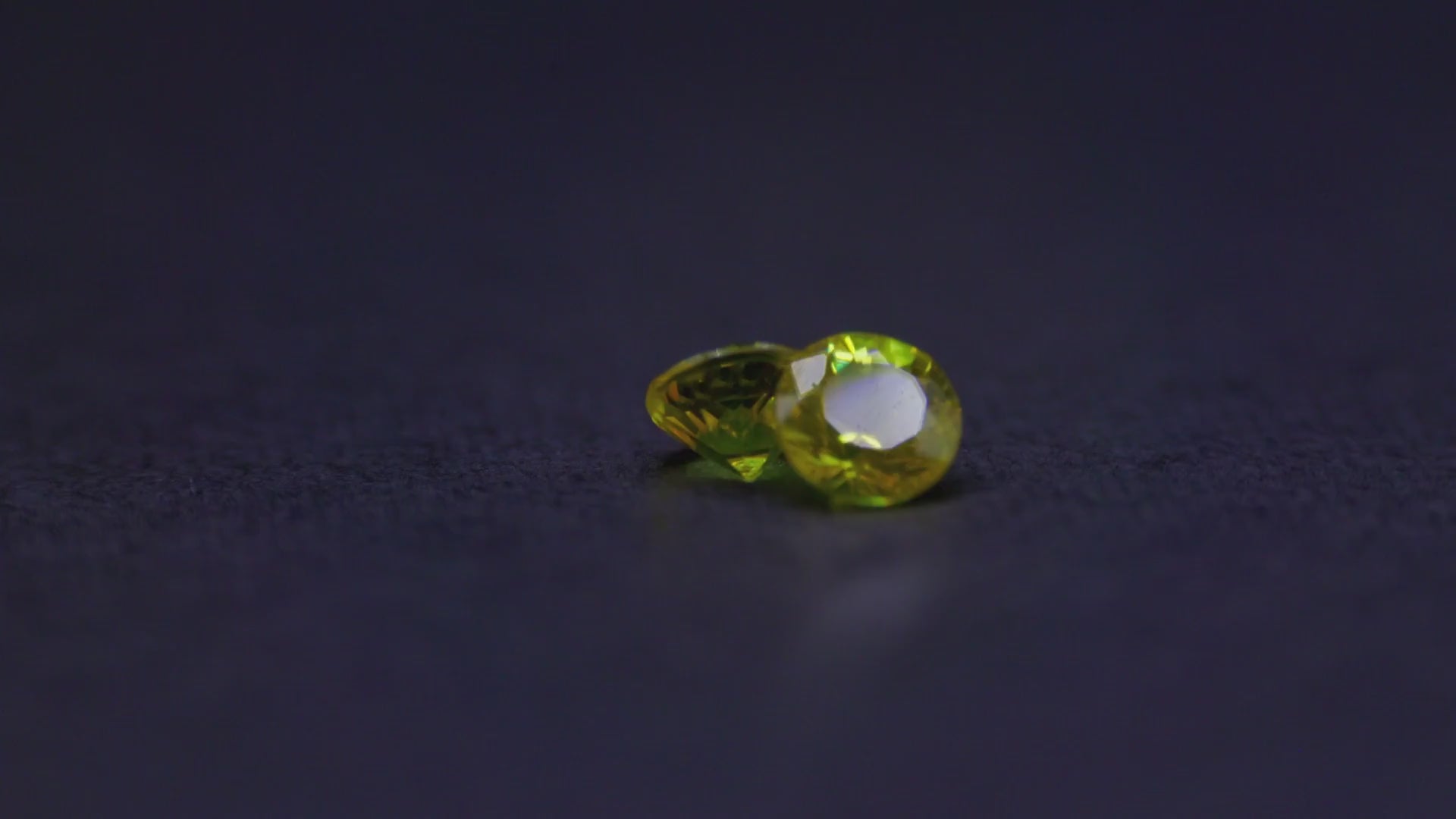 0.70 ct Thai yellow sapphire pair, 4 mm rounds, view 2