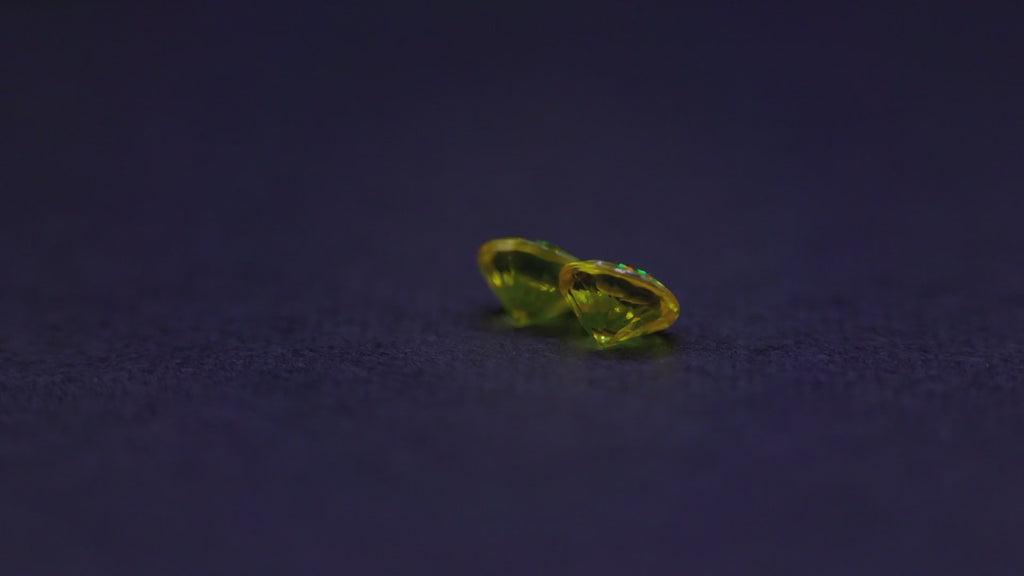 0.65 ct golden yellow sapphire pair, 4 mm rounds, view 2