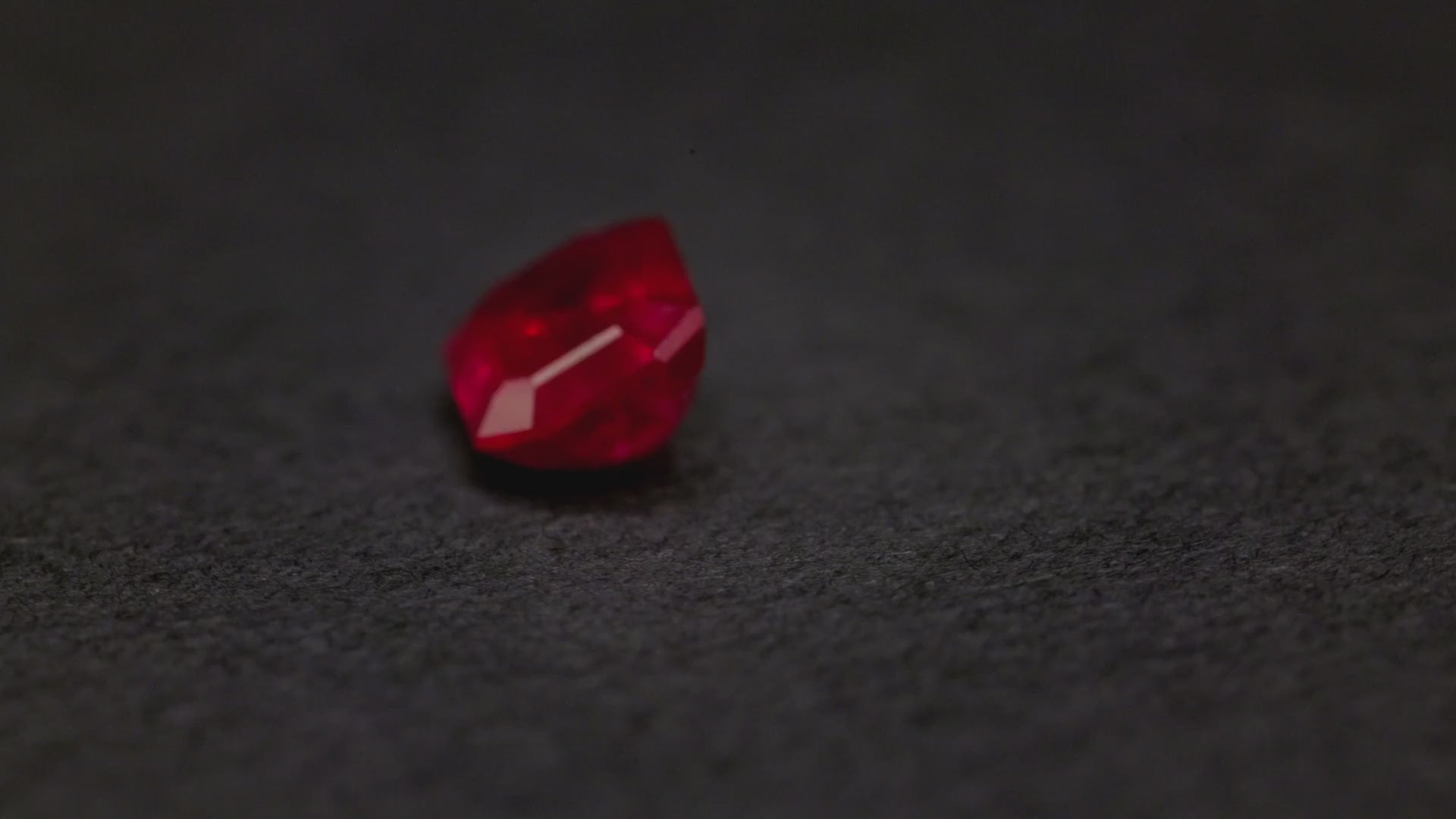 0.60 ct emerald cut Mozambique ruby, loose, view 2
