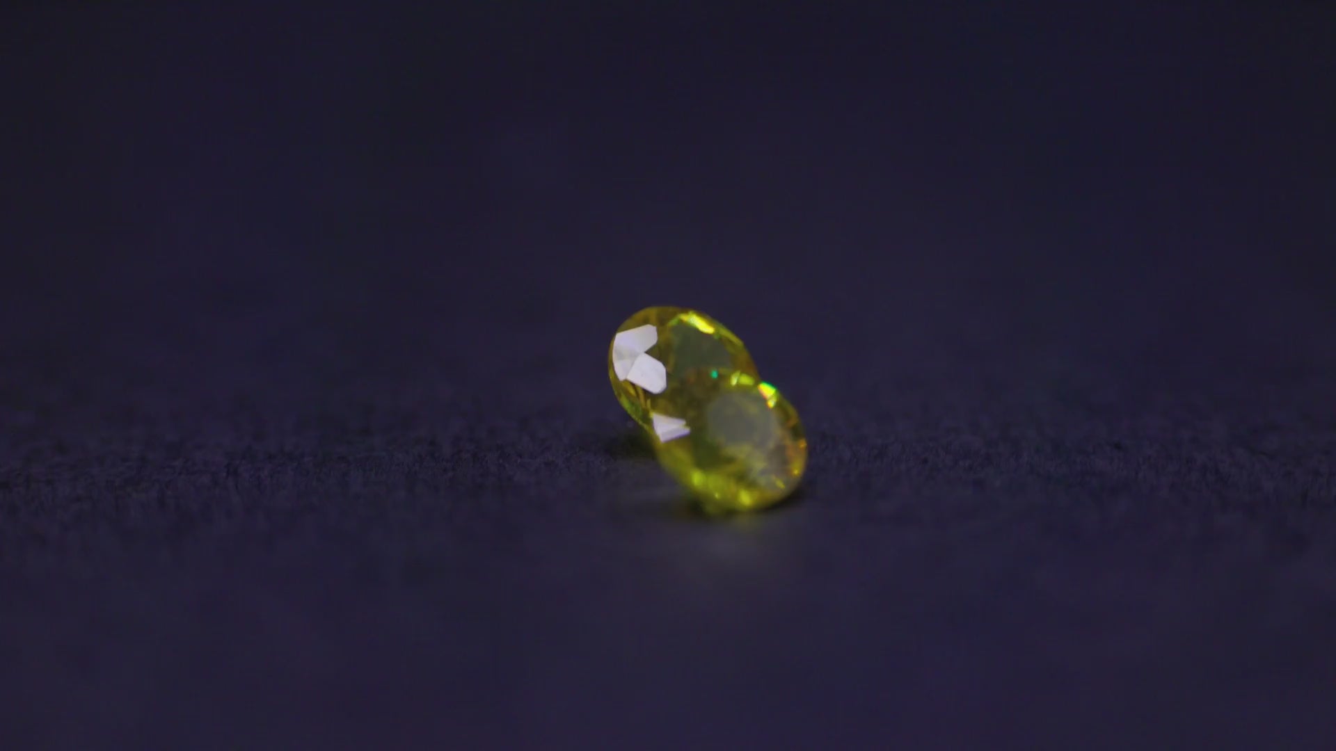 0.68 ct yellow sapphire matched pair, 4 mm rounds, view 2