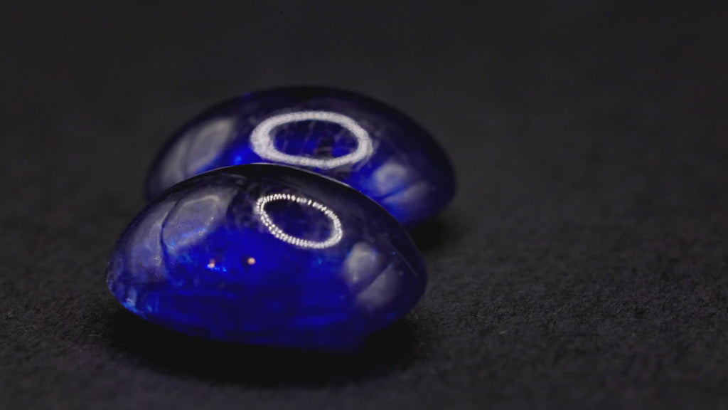 7.90 ct glass-filled blue sapphire cabochon pair, 9x7 mm ovals, view 2