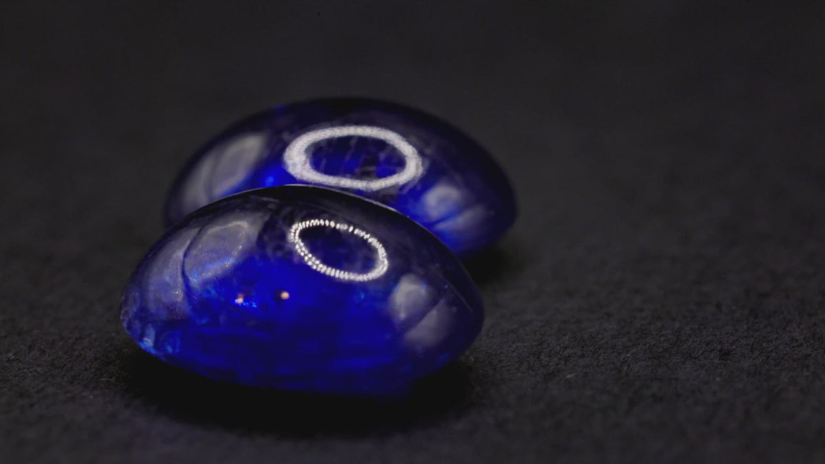 7.90 ct glass-filled blue sapphire cabochon pair, 9x7 mm ovals, view 2