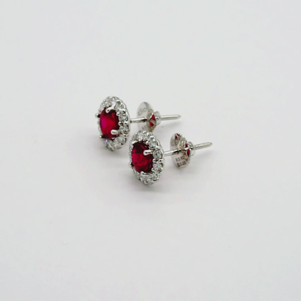 Ruby and diamond halo stud earrings in 18K white gold, view 2