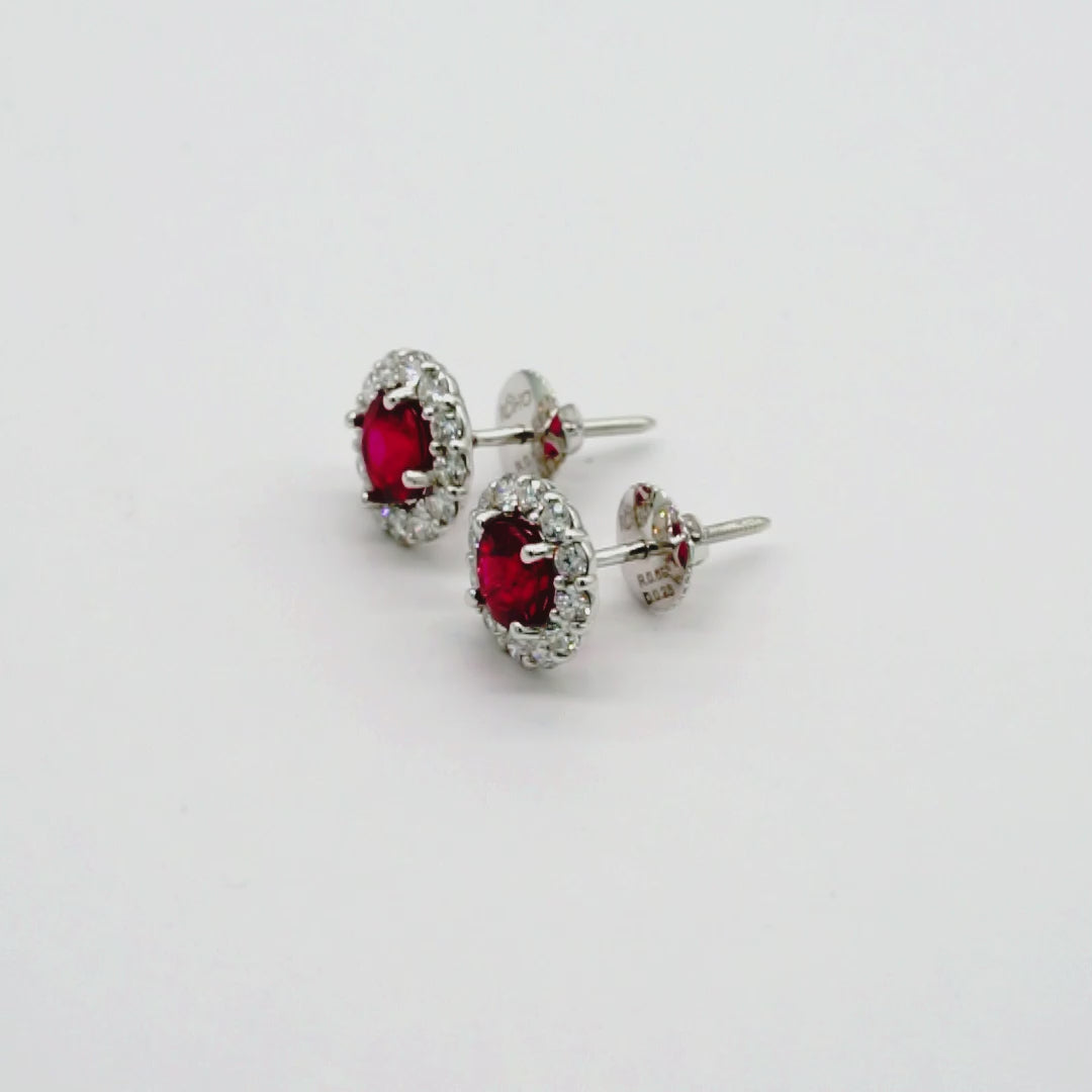 Ruby and diamond halo stud earrings in 18K white gold, view 2
