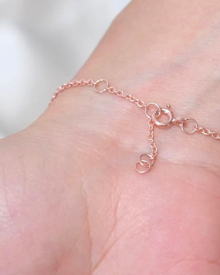 Spring ring clasp and adjustment rings on the rose gold plated emerald heart bracelet chain
