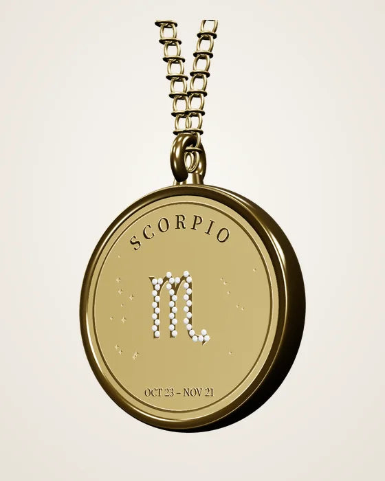 Gold Scorpio zodiac coin necklace with lab-grown diamond glyph