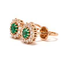 pure_emerald_stud_earrings_with_halo_diamonds