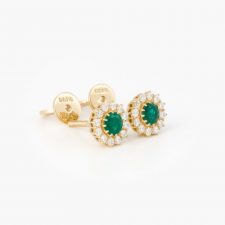 pure_emerald_stud_earrings_with_halo_diamonds