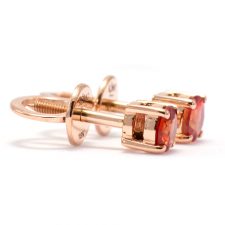vivid_red_sapphire_stud_earrings_in_18k_gold_rose