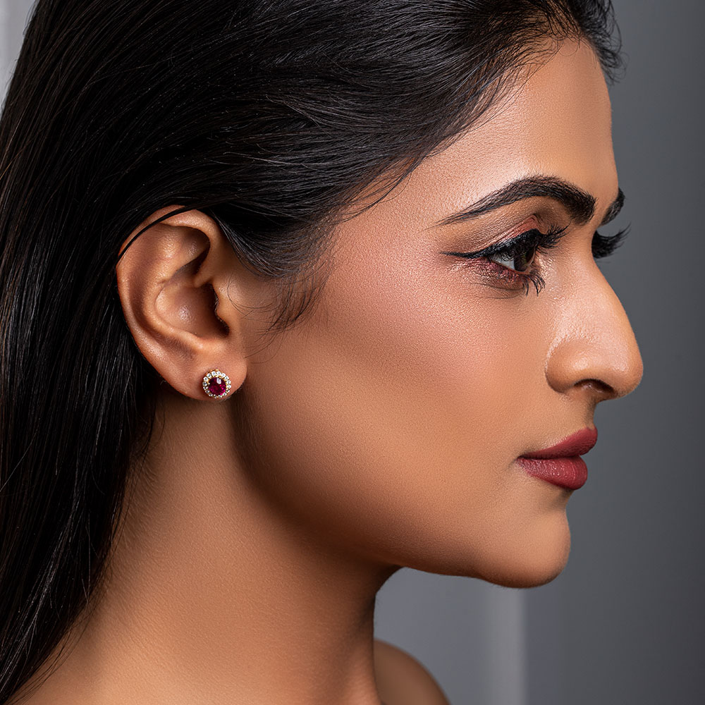Elegant_Ruby_Stud_Earrings_with_Halo_Diamonds_yellow